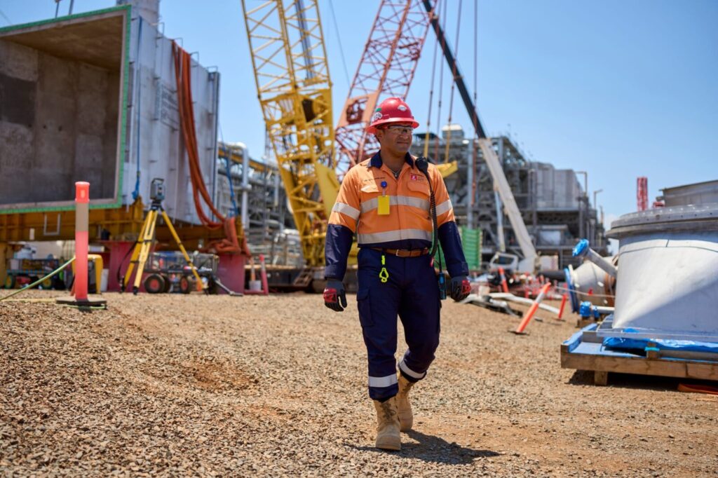 Joseph walking through a construction site 